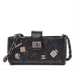 Chanel® lucky charms mini clutch with chain
