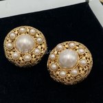 Chanel® 80's large gold baroque clip earrings with pearls